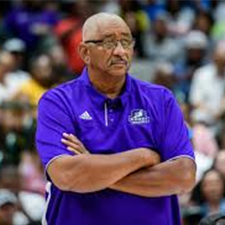 George Gervin coaching a game