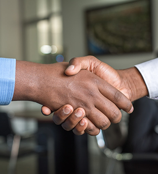 Two people shaking hands