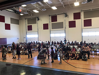 Students participating in a hula hoop activity